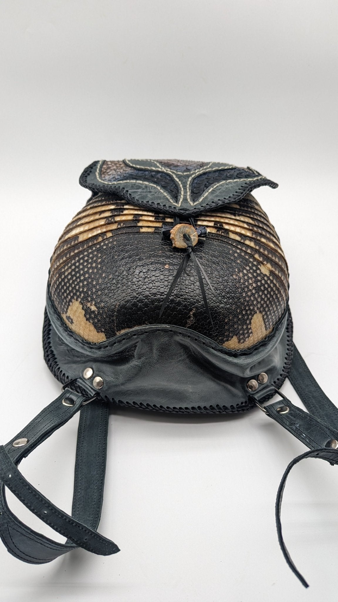 Bohemian Armadillo Snakeskin Whipstitch Leather Backpack with Antler Bone Closure, Bohemian Bag with Armadillo Shell and Fringe Charm - Sobék